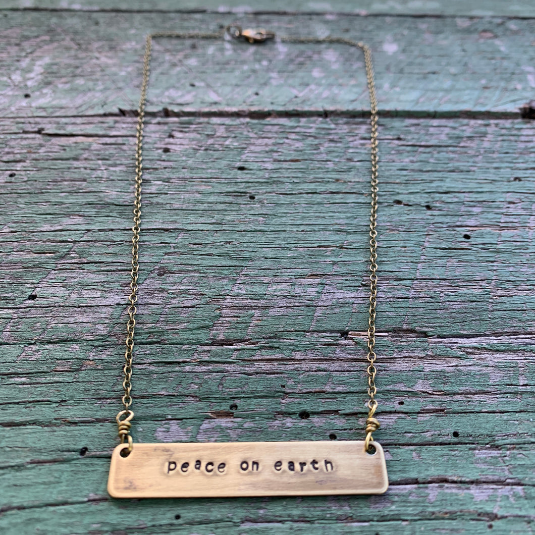 peace on earth hand-stamped brass necklace, made-to-order