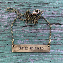 Load image into Gallery viewer, peace on earth hand-stamped brass necklace, made-to-order
